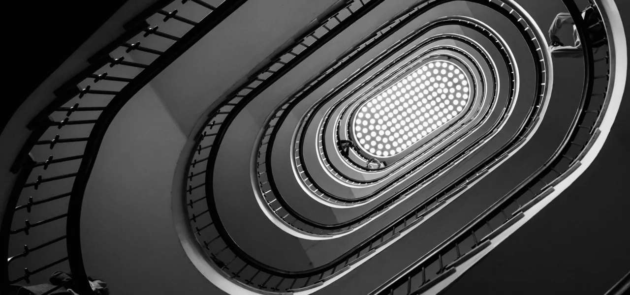 black-and-white-photo-of-old-spiral-staircase-spi-2025-03-09-14-44-25-utc